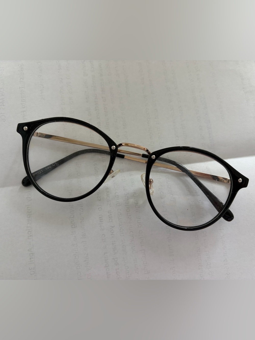 Round Black and Gold Eyeglass Frames